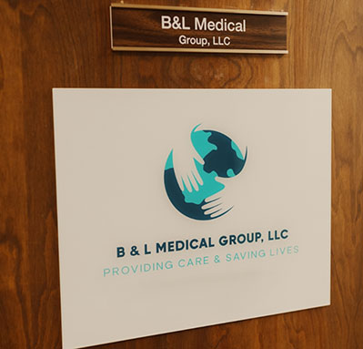 B and L Medical Group L L C sign on wooden wall